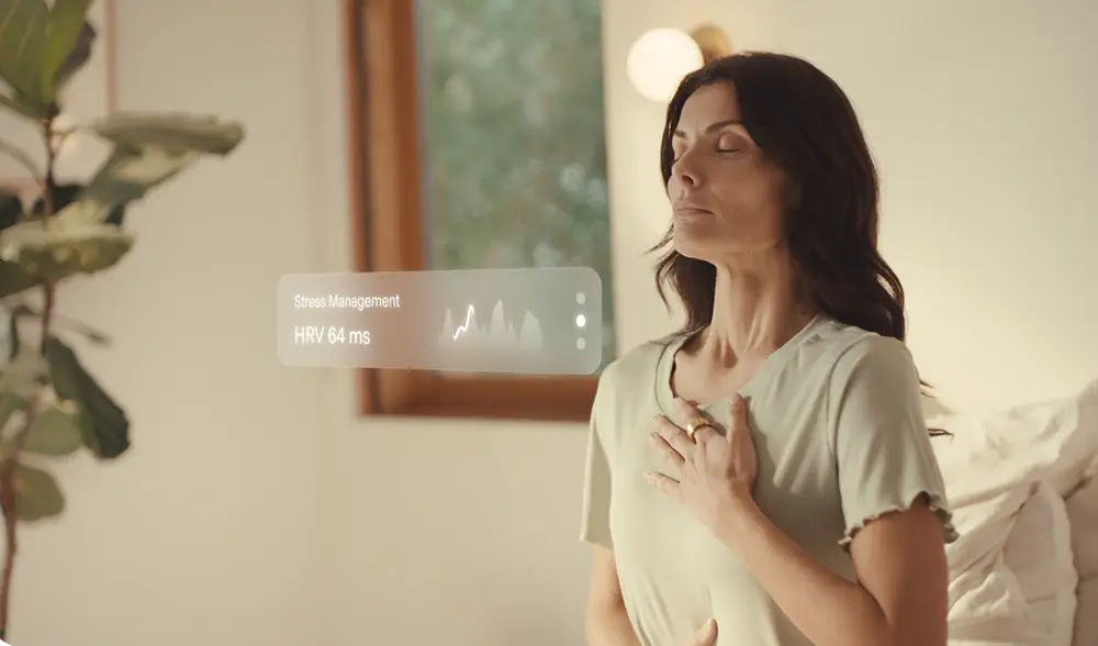 Woman with hand on chest